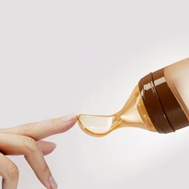 SqueezeFeeder Baby Silikon-Fütterflasche mit Löffel