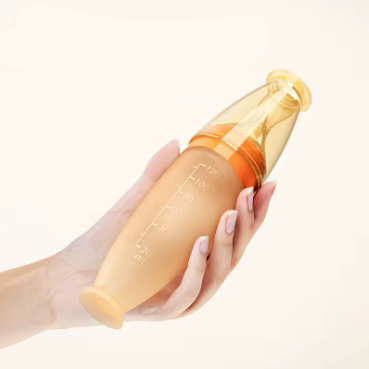 SqueezeFeeder Baby Silikon-Fütterflasche mit Löffel