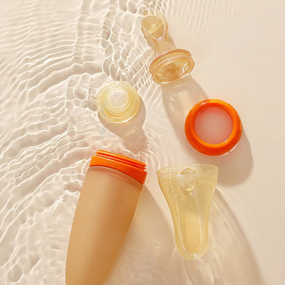 SqueezeFeeder Baby Silikon-Fütterflasche mit Löffel